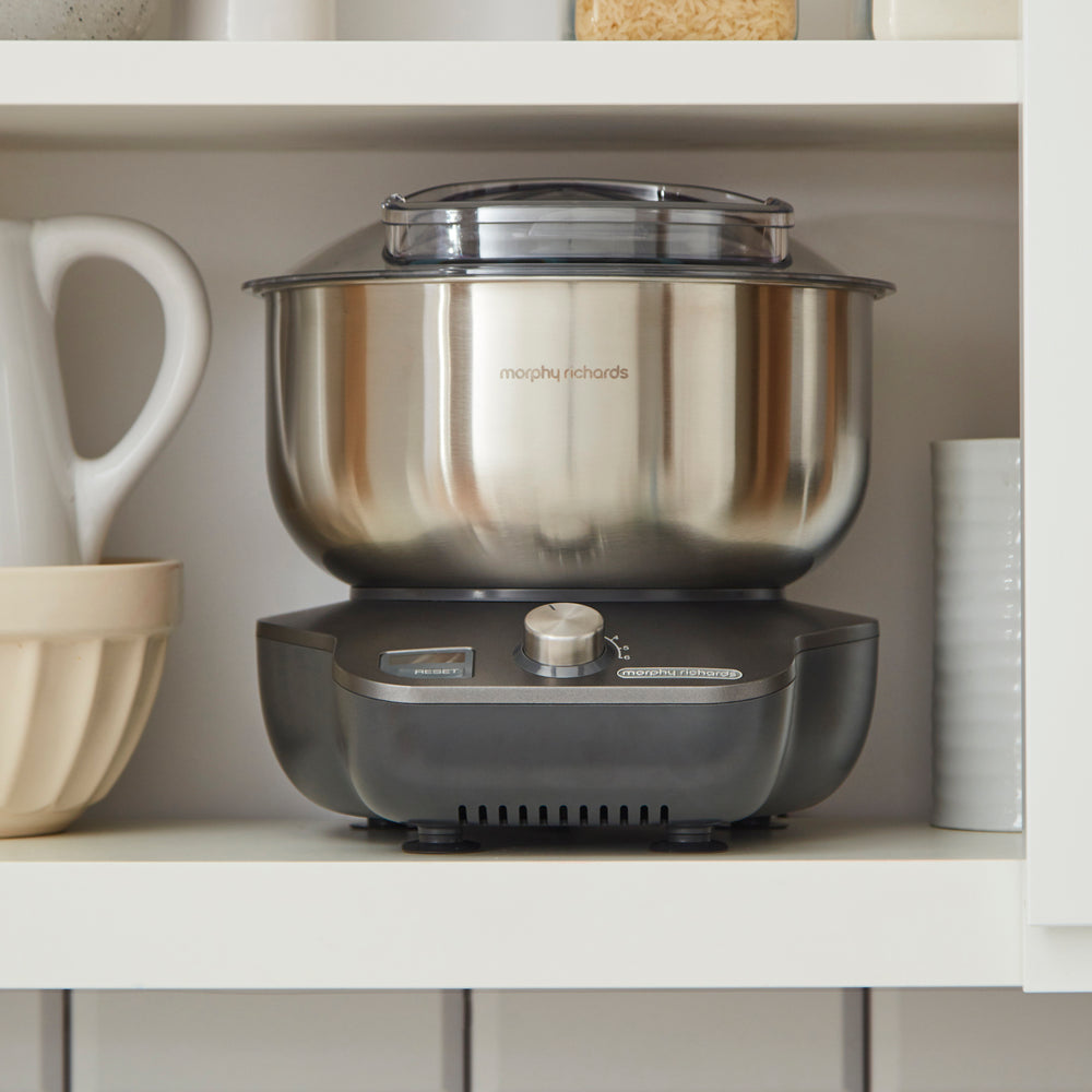 stand mixer inside kitchen cupboard
