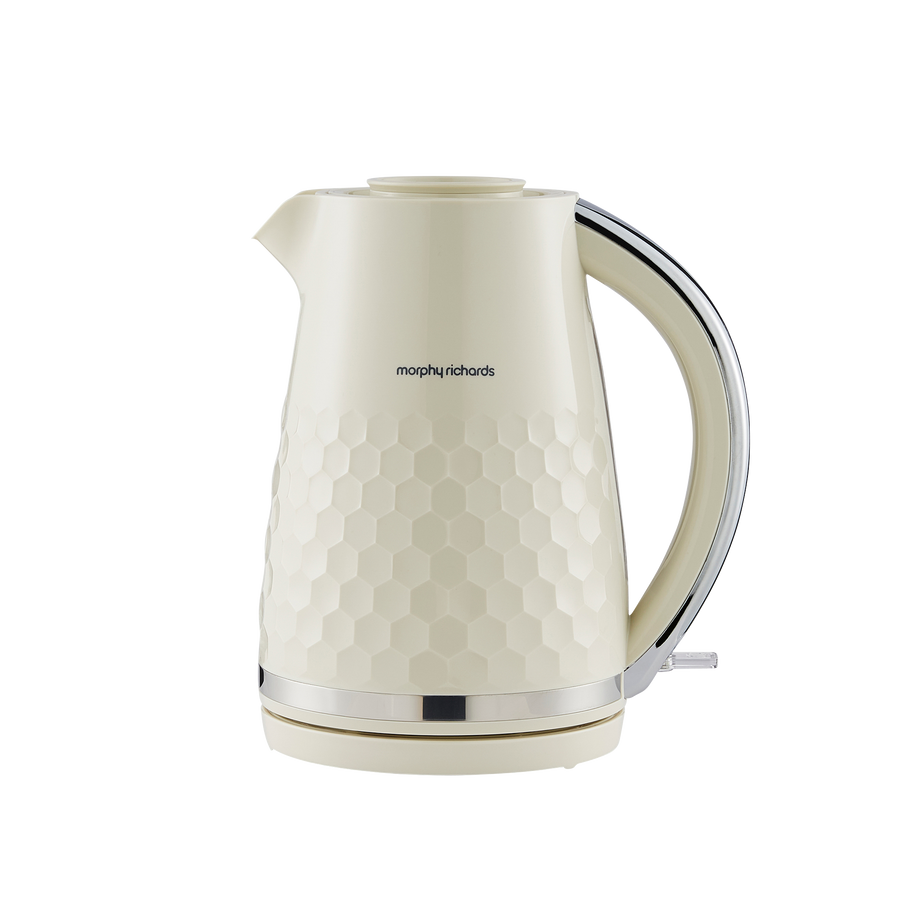 Cream-colored electric kettle with honeycomb pattern on a white background