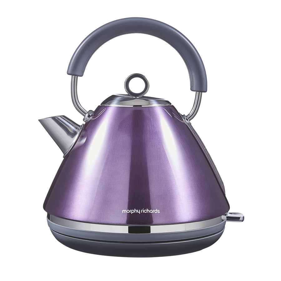 Purple electric kettle with a gray handle on a white background