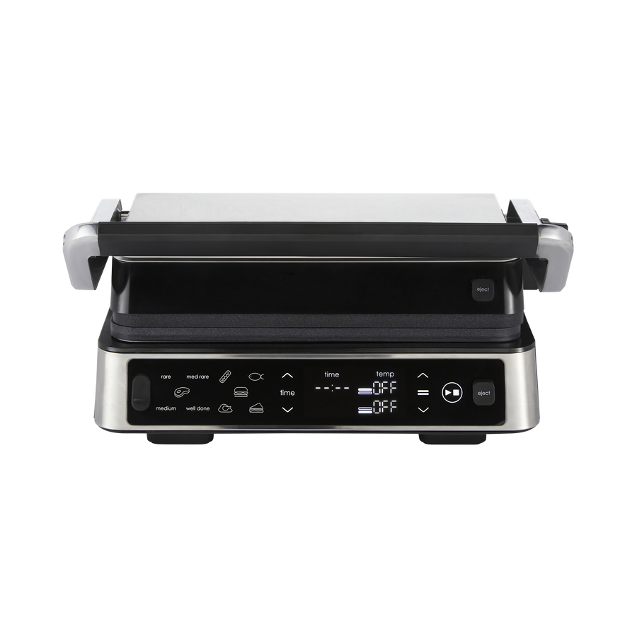 Black and silver grill with digital controls on a white background